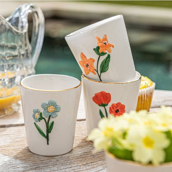 A Set of Hand Painted Dolomite Flower Tumblers