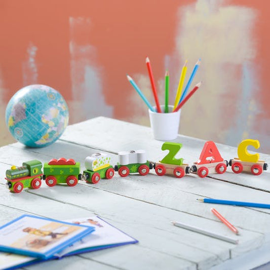 Personalised Wooden Name Train in Dinosaur Theme