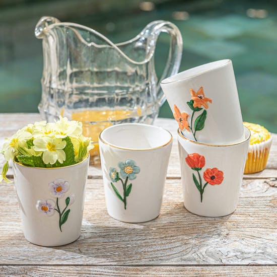 A Set of Hand Painted Dolomite Flower Tumblers